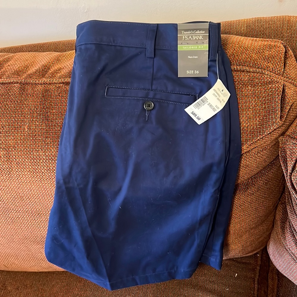 Brand new Jos. A. Bank navy dress shorts. Size 36. New with tags. Tailored fit.